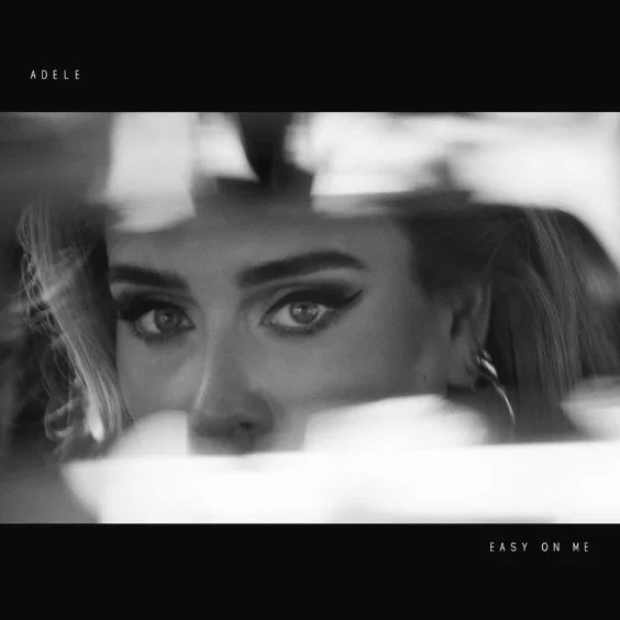 Adele's Unique Approach to Pop Stardom: Balancing Retreat and Success
