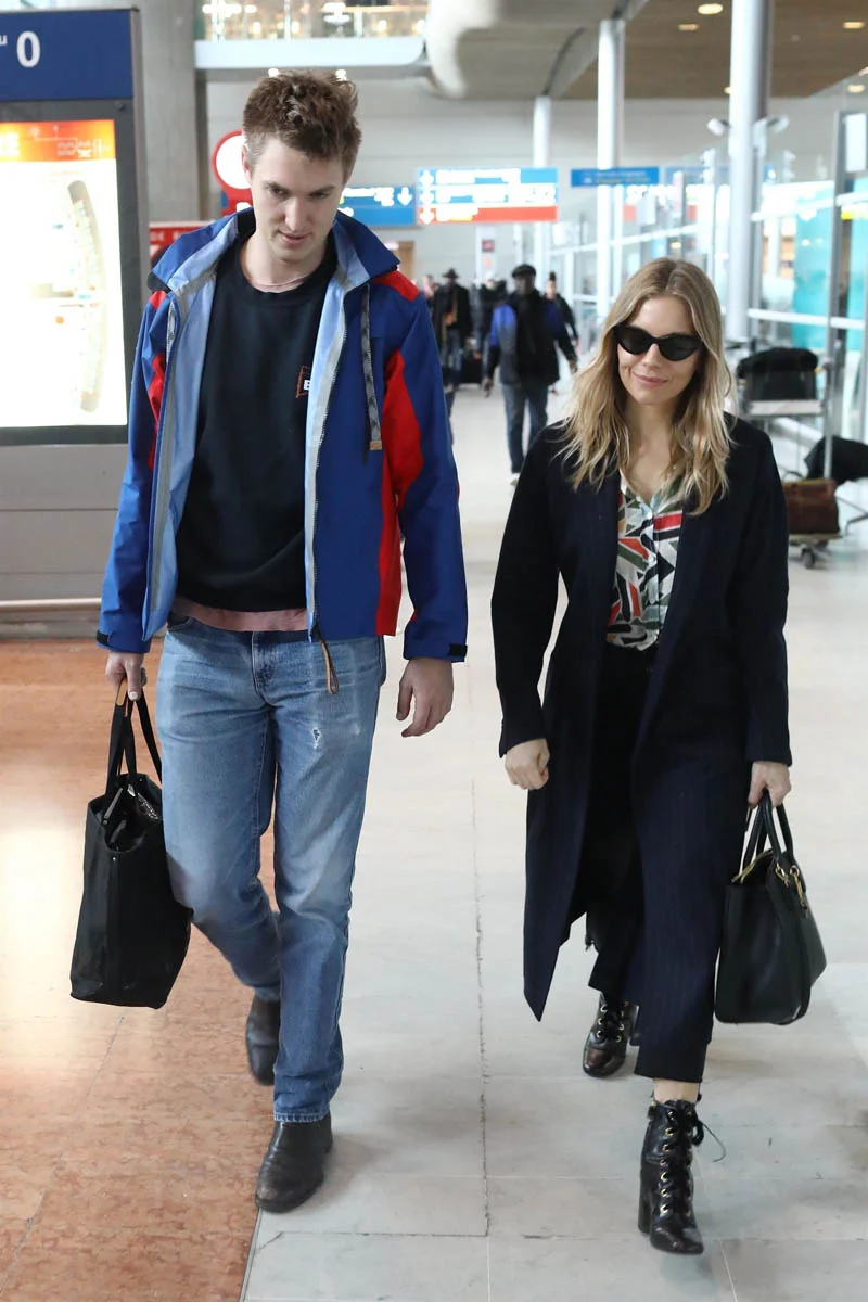 Sienna travels with her boyfriend