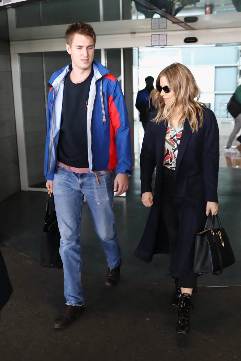Sienna travels with her boyfriend