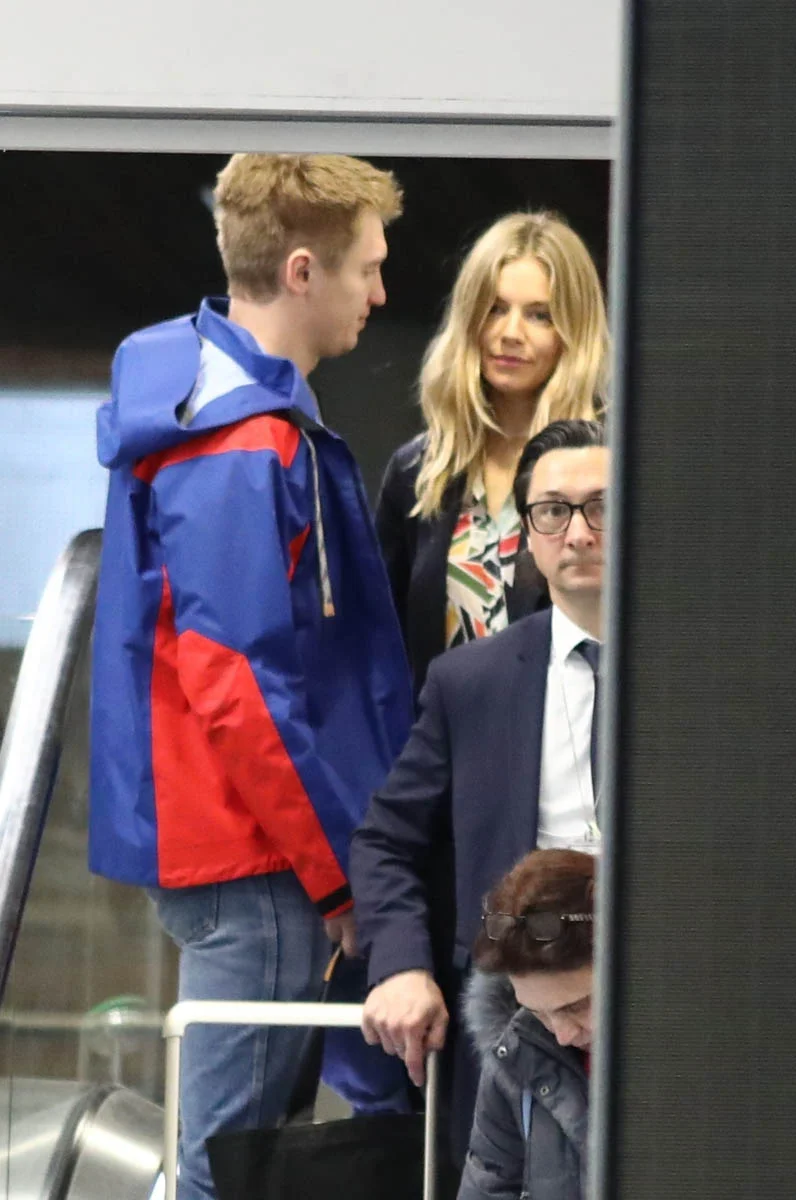 Sienna travels with her boyfriend