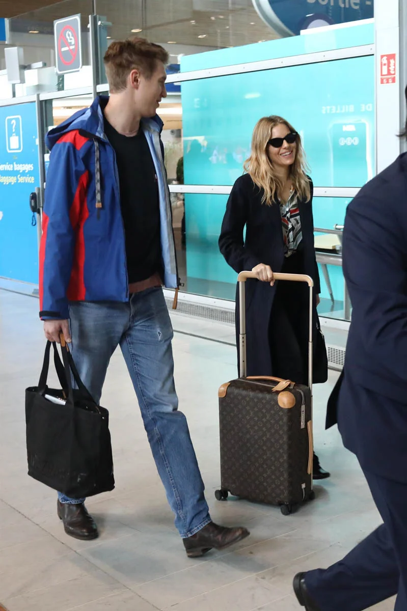 Sienna travels with her boyfriend
