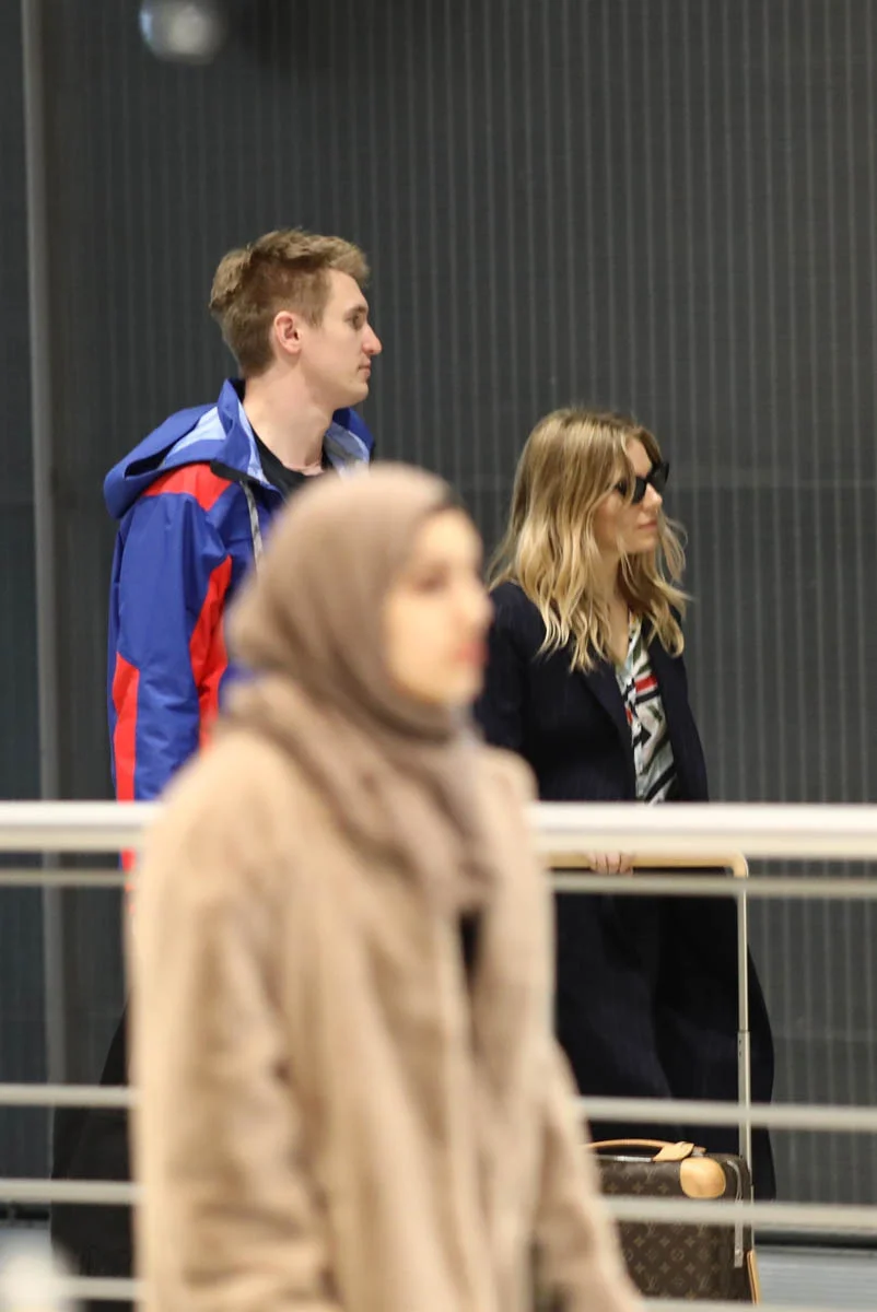 Sienna travels with her boyfriend