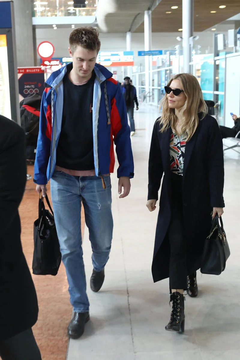 Sienna travels with her boyfriend